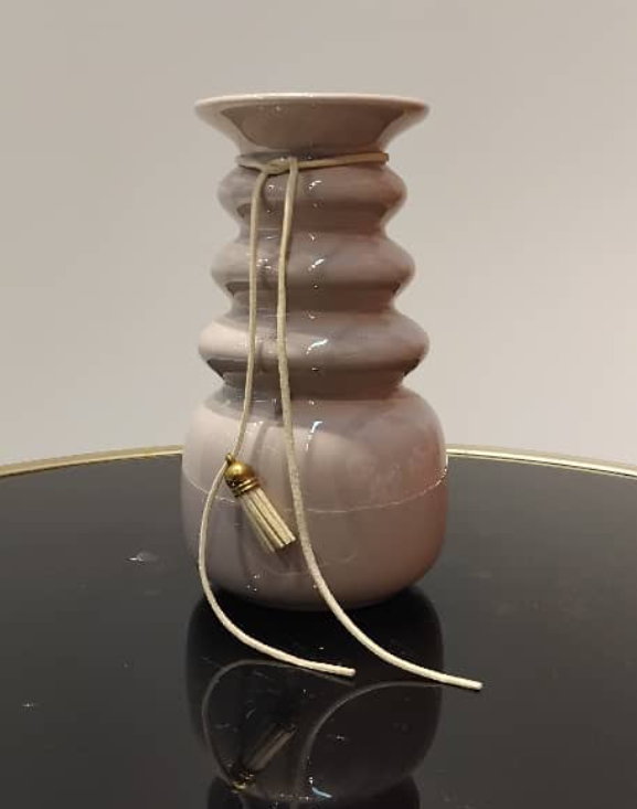 Elegant Ribbed Ceramic Vase with Tassel Accent